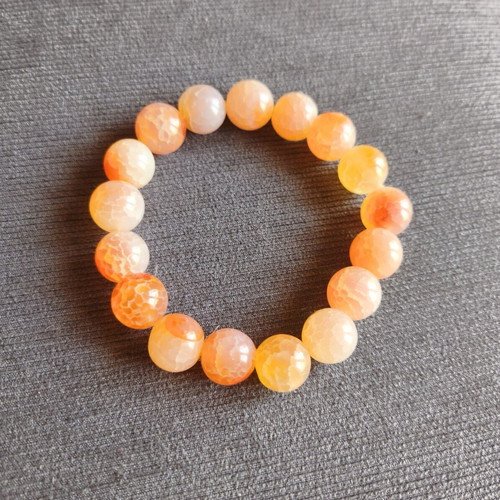 Bracelet with orange beads elastic, like new