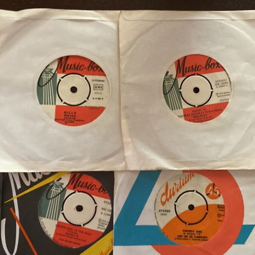 Set of 4 used 45 rpm vinyl records, pop genre