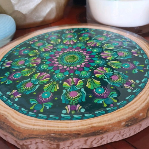 Handpainted wooden decorative plate with mandala design