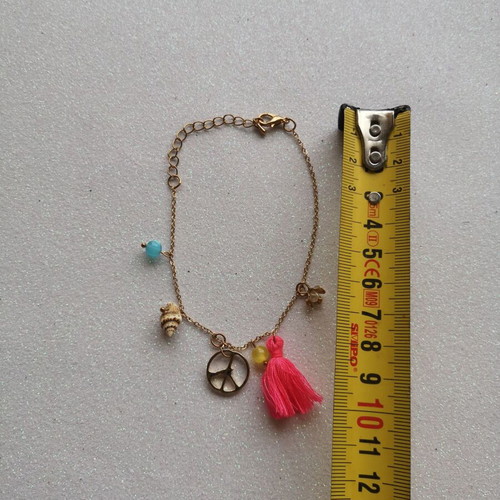 Bracelet like new with details and tassel