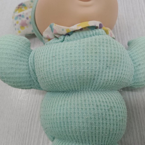 Light-up Huggy toy from the 1990s, fabric stains