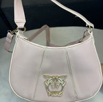 Pink shoulder bag with adjustable strap