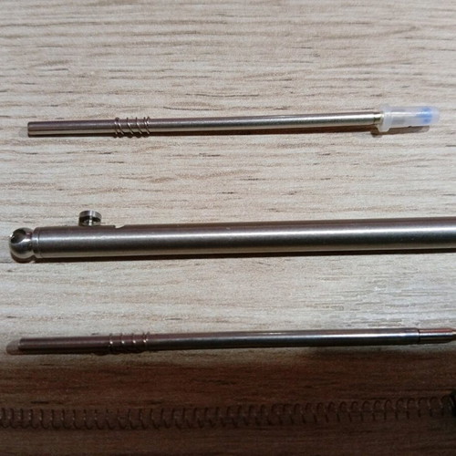 Mini titanium pen like new