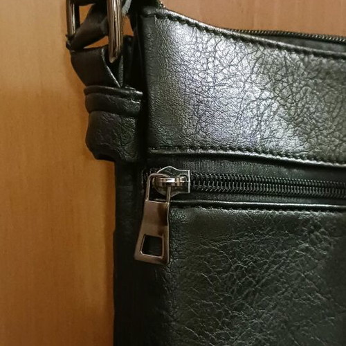 Angel crossbody bag like new, black with 6 separate compartments