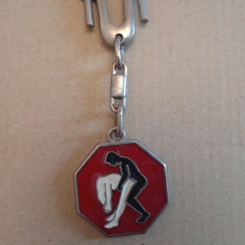 Vintage keychain like new with schematic sexual position design