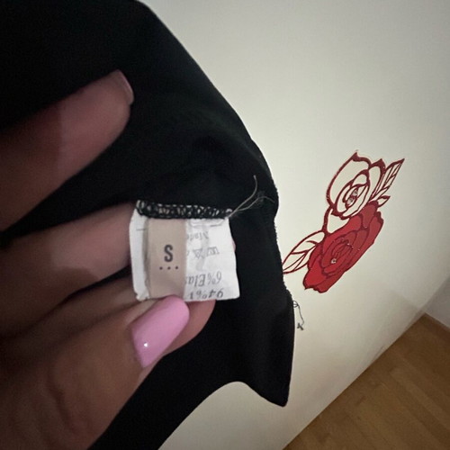 Black draped top with back opening like new, size S