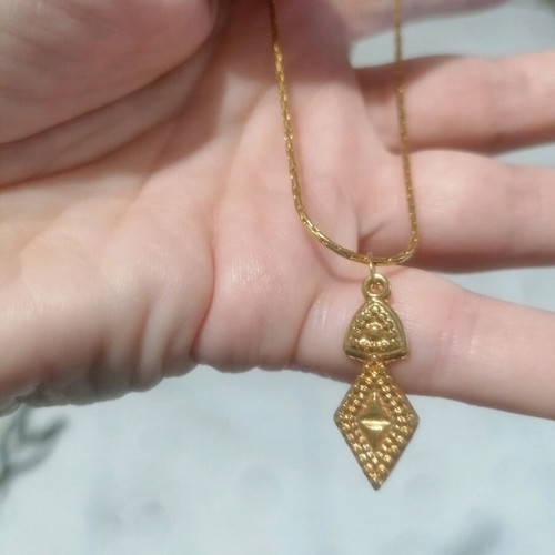 Steel necklace gold color like new