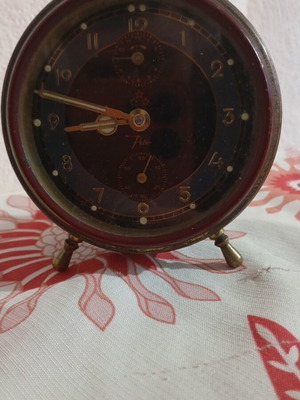 Vintage table clock used, wind-up and functional