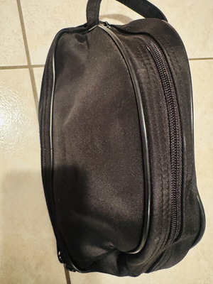 Black fabric toiletry bag with two compartments like new