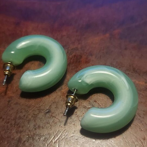 Plastic earrings new, green with white patterns
