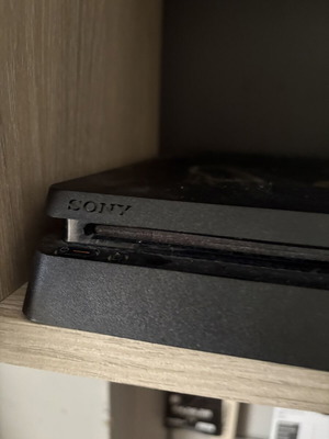 PS4 console with 1 controller and games bundle