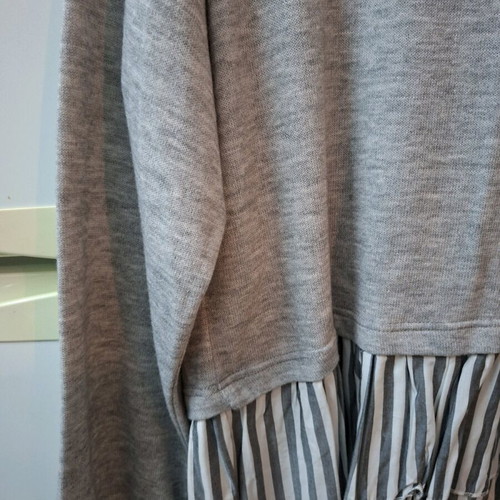 Long-sleeve blouse with ruffle hem gray new