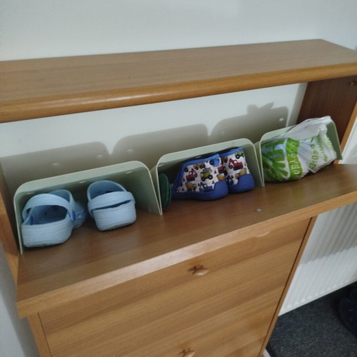 Shoe rack like new with repaired plastic on last shelf