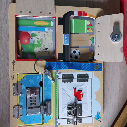 Melissa & Doug wooden board with locks used