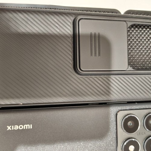 Xiaomi 14T Pro smartphone used with Nilkin case and Xiaomi 67W charger