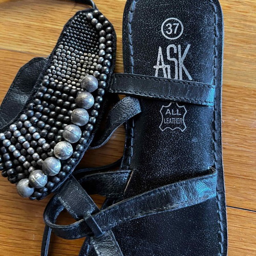 Leather vintage black sandals new, decorated with metal pearls
