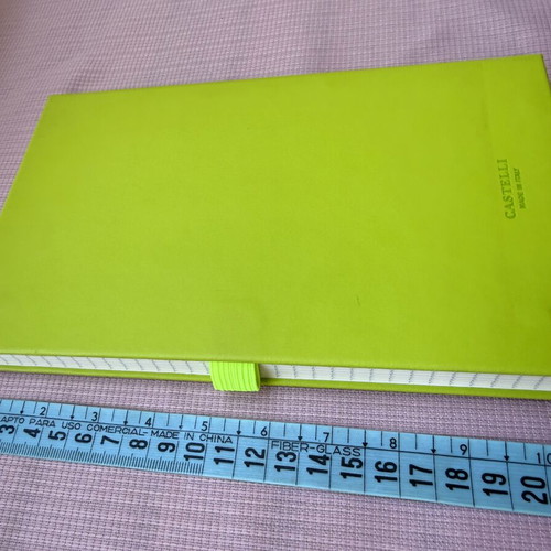 Lined notebook with cover defect