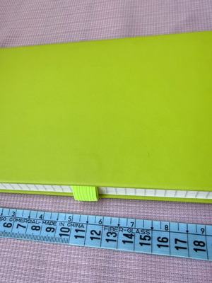 Lined notebook with cover defect