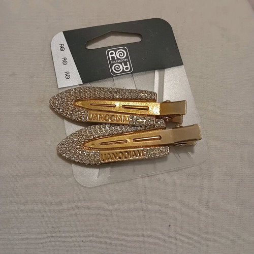 Hair clip new with rhinestones gold
