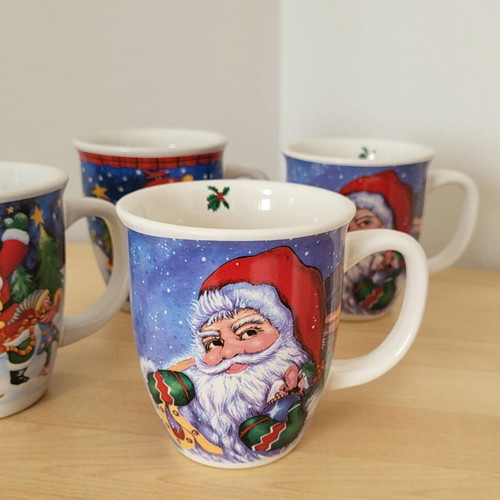 Set of 7 used Christmas mugs in two sizes