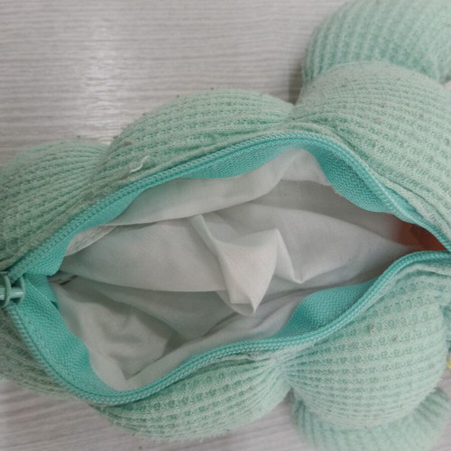 Light-up Huggy toy from the 1990s, fabric stains