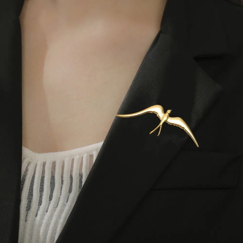 Steel women's swallow brooch new, gold and silver
