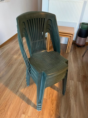 Set of 4 green plastic garden chairs
