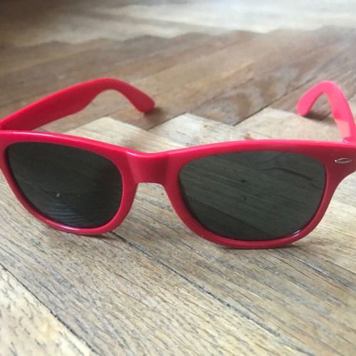 Sunglasses like new with red plastic frame