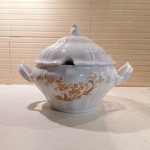 Porcelain soup tureen used with gold floral details