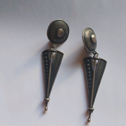 Silver earrings used, large with clips, black and silver