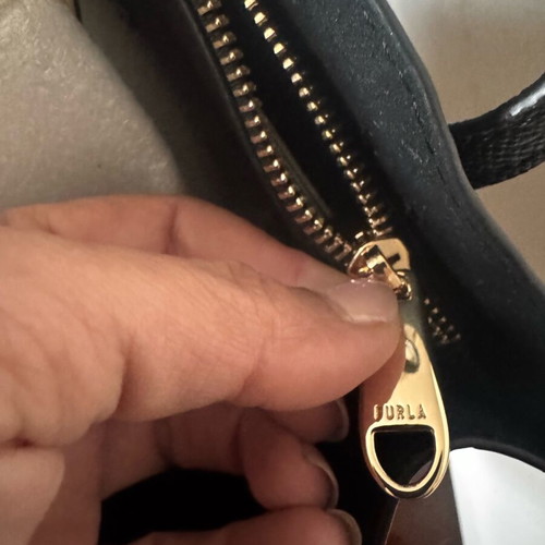 Furla black handbag new with tag