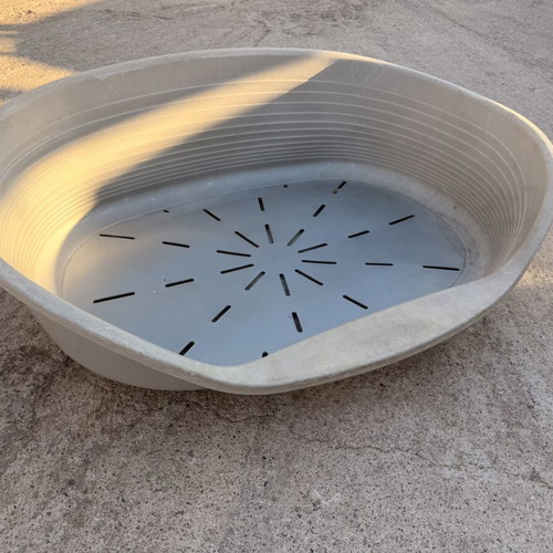 Large plastic dog bed used, outdoor weatherproof