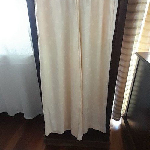 Women's palazzo pants like new, pale yellow with white polka dots