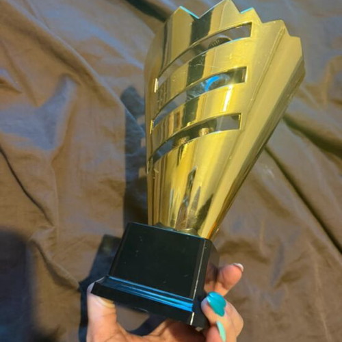 Award trophy used with tennis player figure for padel tournaments