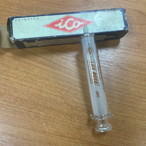 Glass syringe with metal needle new