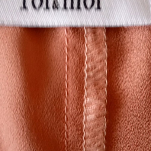 Toi Moi blouse like new, peach color with bold cuffs, size M