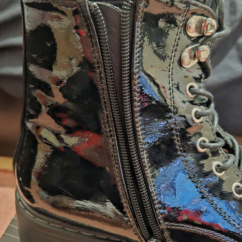 Women’s black patent leather boots like new with thick sole