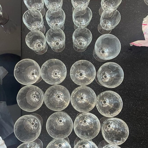 Glasses like new, 17 large water and 11 wine
