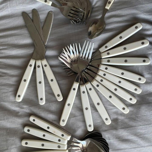 Vintage cutlery set like new with 7 large spoons, 1 small, 10 large and 10 small forks, 3 knives
