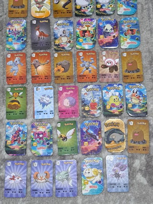 Pokemon metal caps like new, set of 35 pieces