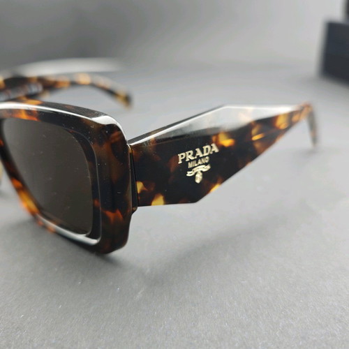 Prada sunglasses used with original box and case
