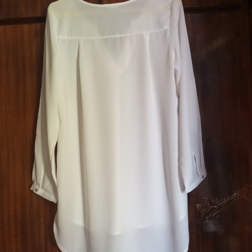 White airy long shirt with V neckline
