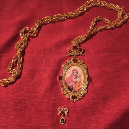 Religious pendant new gold-plated with small defect