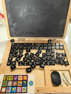 Educational wooden laptop like new with blackboard and wooden phone