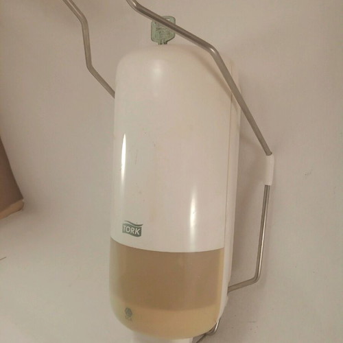 Tork dispenser device used