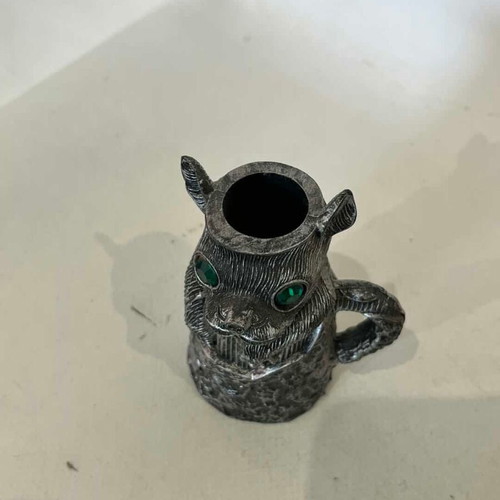 Vintage animal figure candle holder with green eyes, resin
