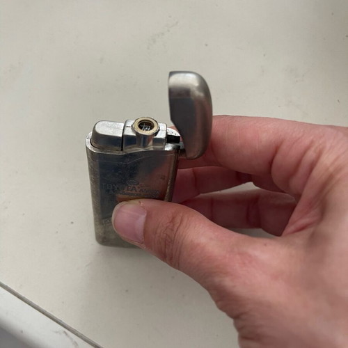 Lighter unused, needs refilling