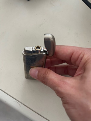 Lighter unused, needs refilling