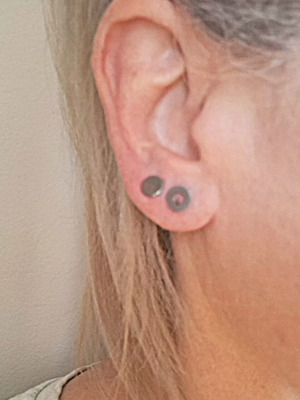 Silver asymmetric 925 studs with geometric circles, like new
