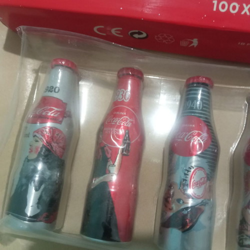 Coca-Cola Mini Bottles 100 Years Collectible Set like new